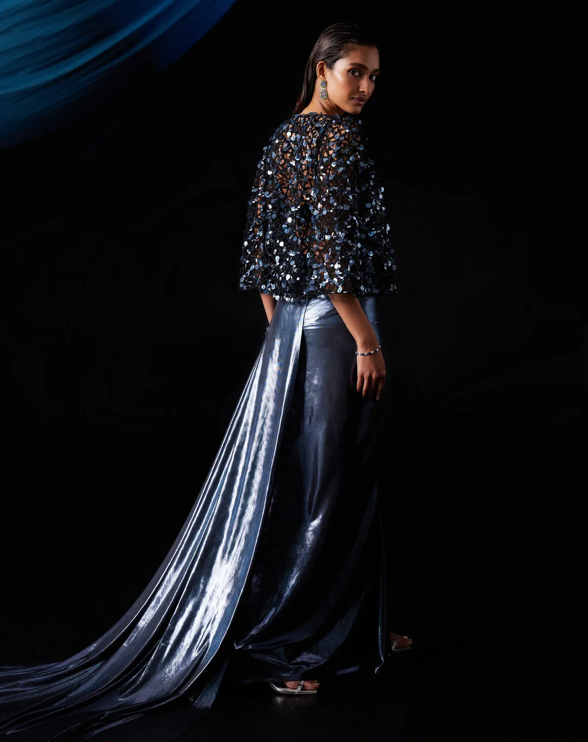 Metallic blue corset gown and cape