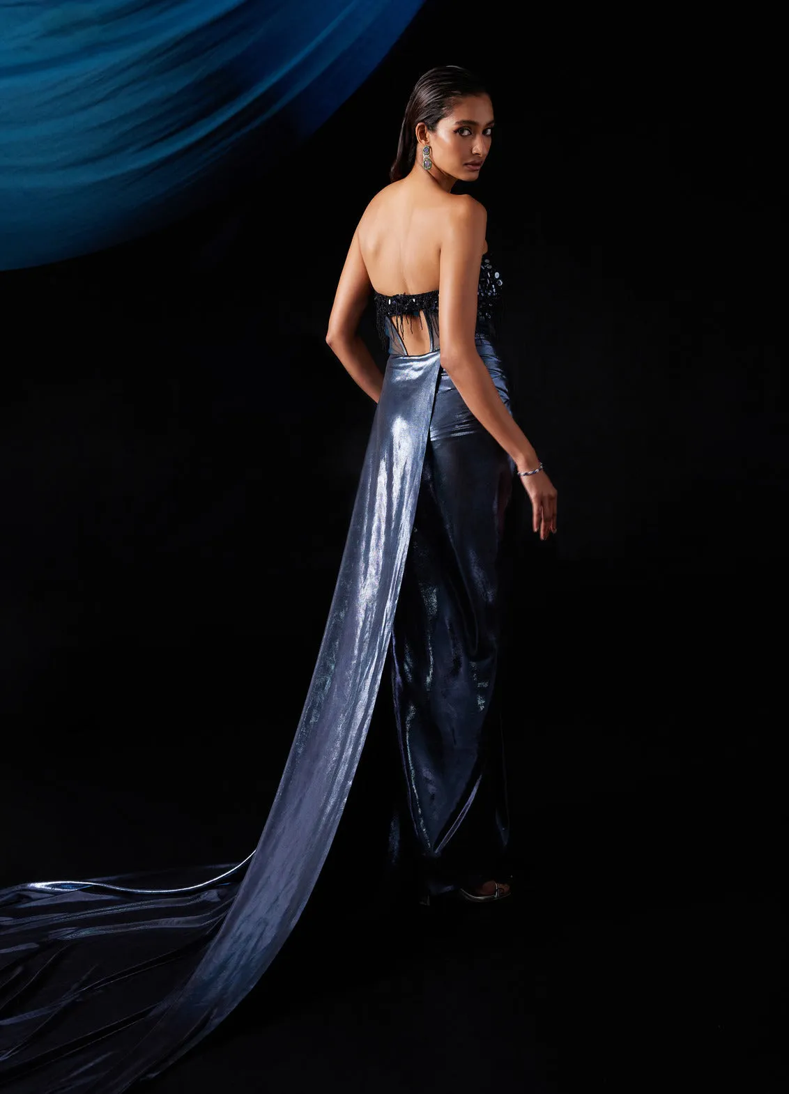 Metallic blue corset gown and cape
