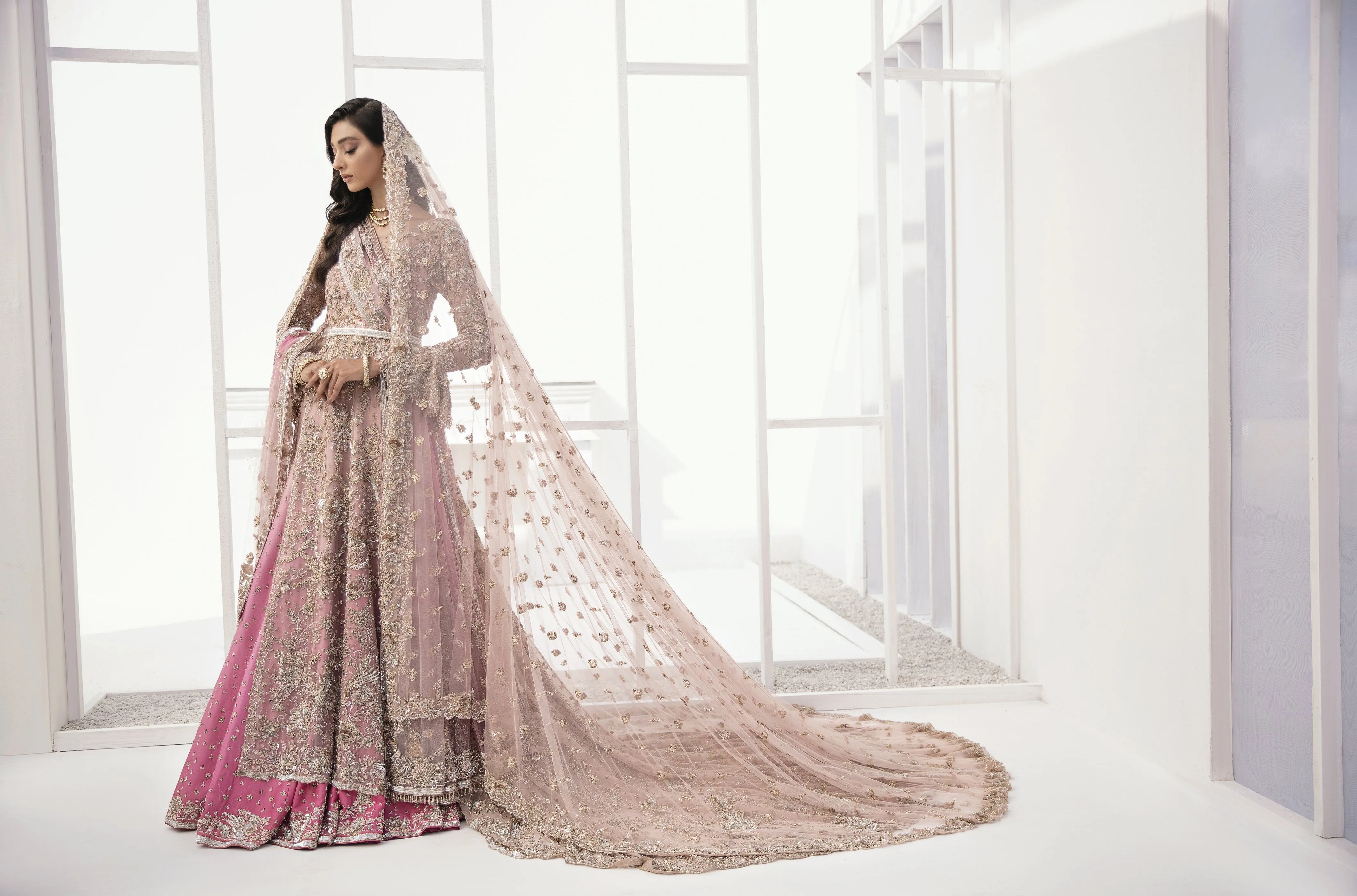 Pakistani Bridal Lehenga Designs in Embellished Heavy Zardozi Work for Wedding Wear in Baby Pink Lehenga in Gown Style #BN944