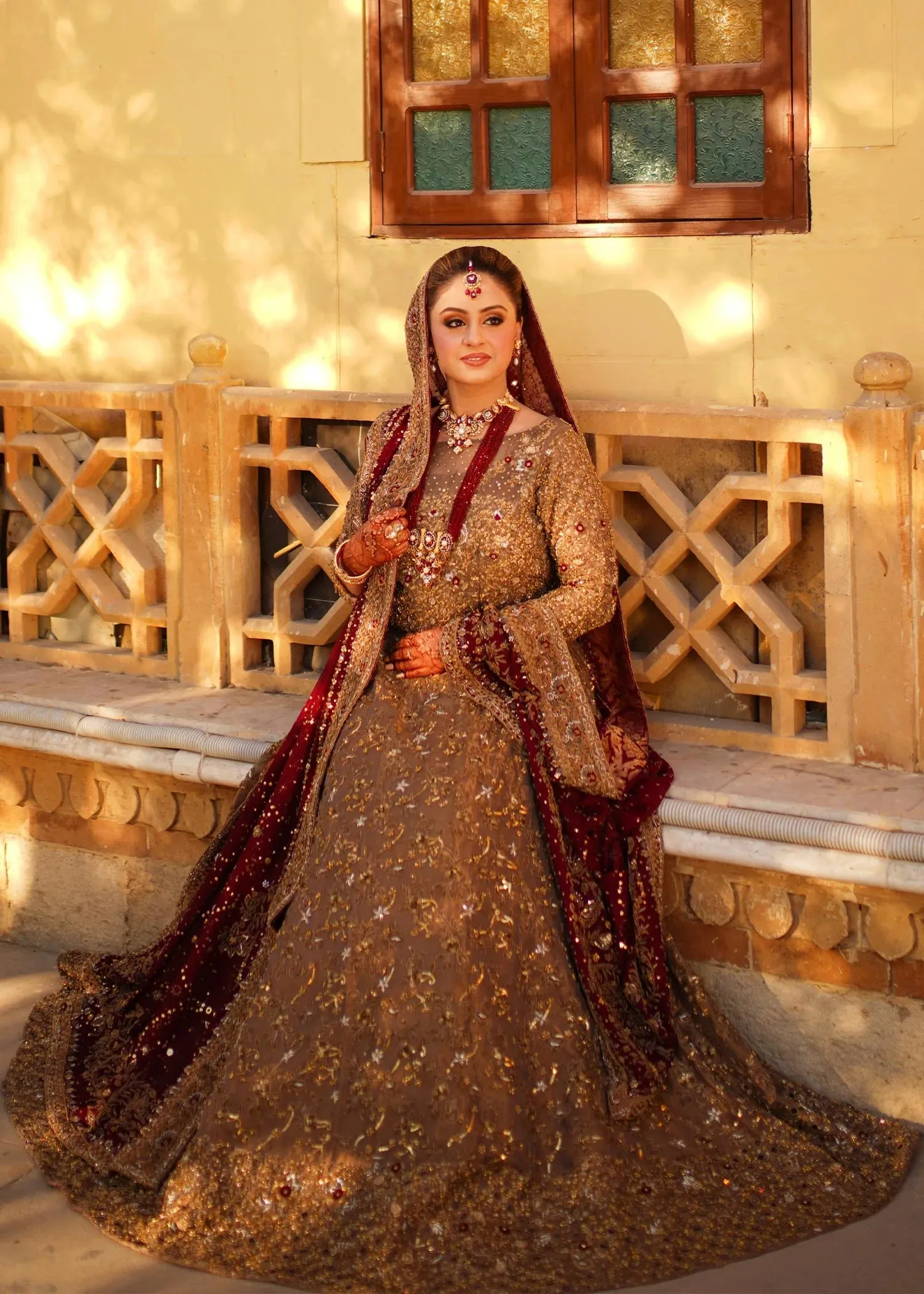 Pakistani Bridal Outfit in Net Choli and Lehenga Style
