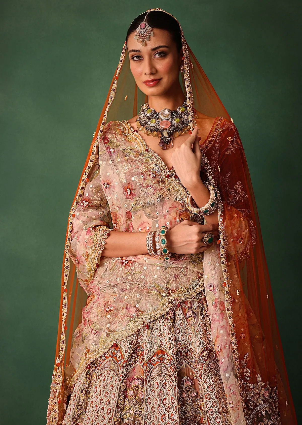 Rust V Neck Blouse With Heavy Jaal Cutdana Work Bridal Lehenga And Heavy Dupatta