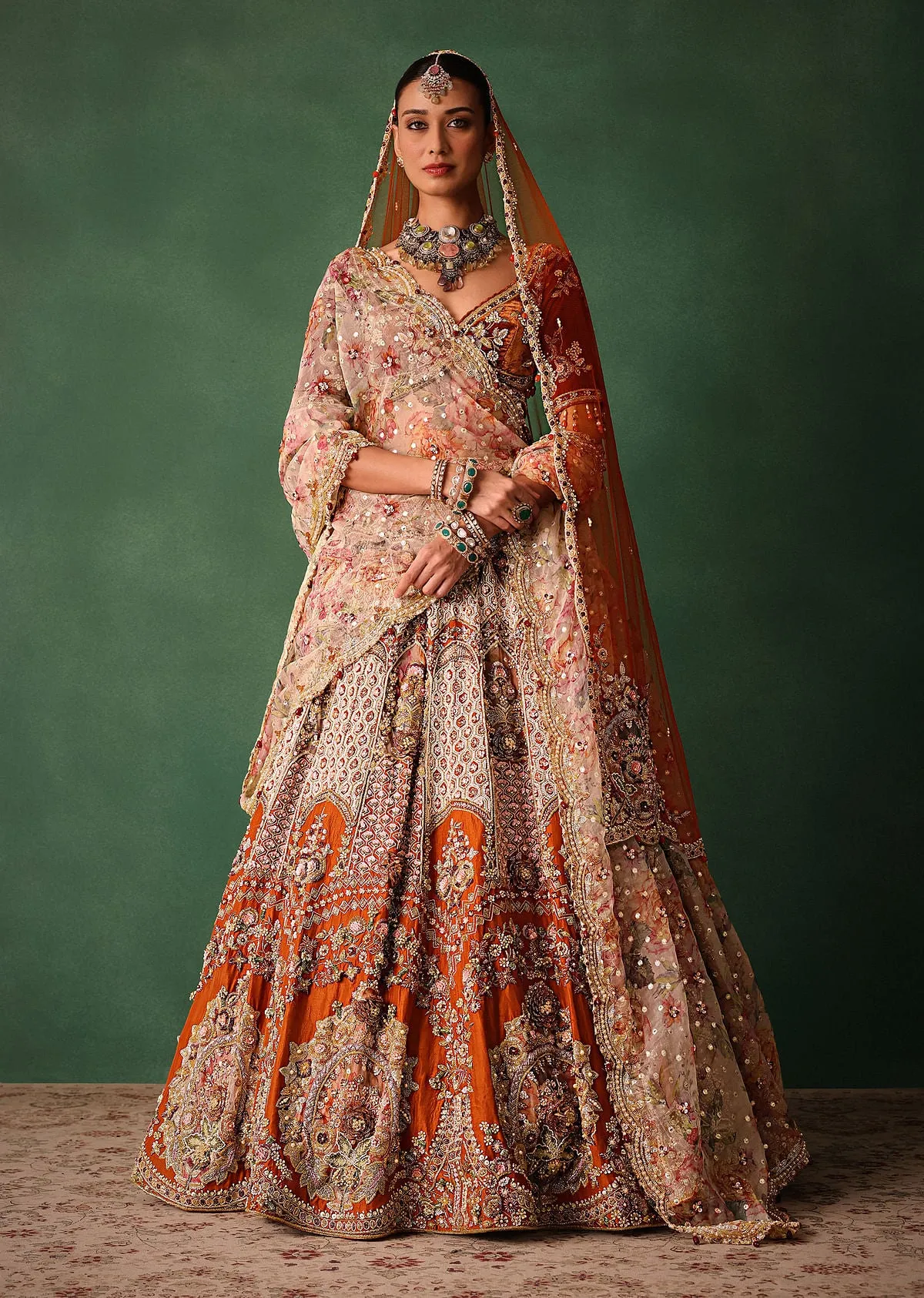 Rust V Neck Blouse With Heavy Jaal Cutdana Work Bridal Lehenga And Heavy Dupatta