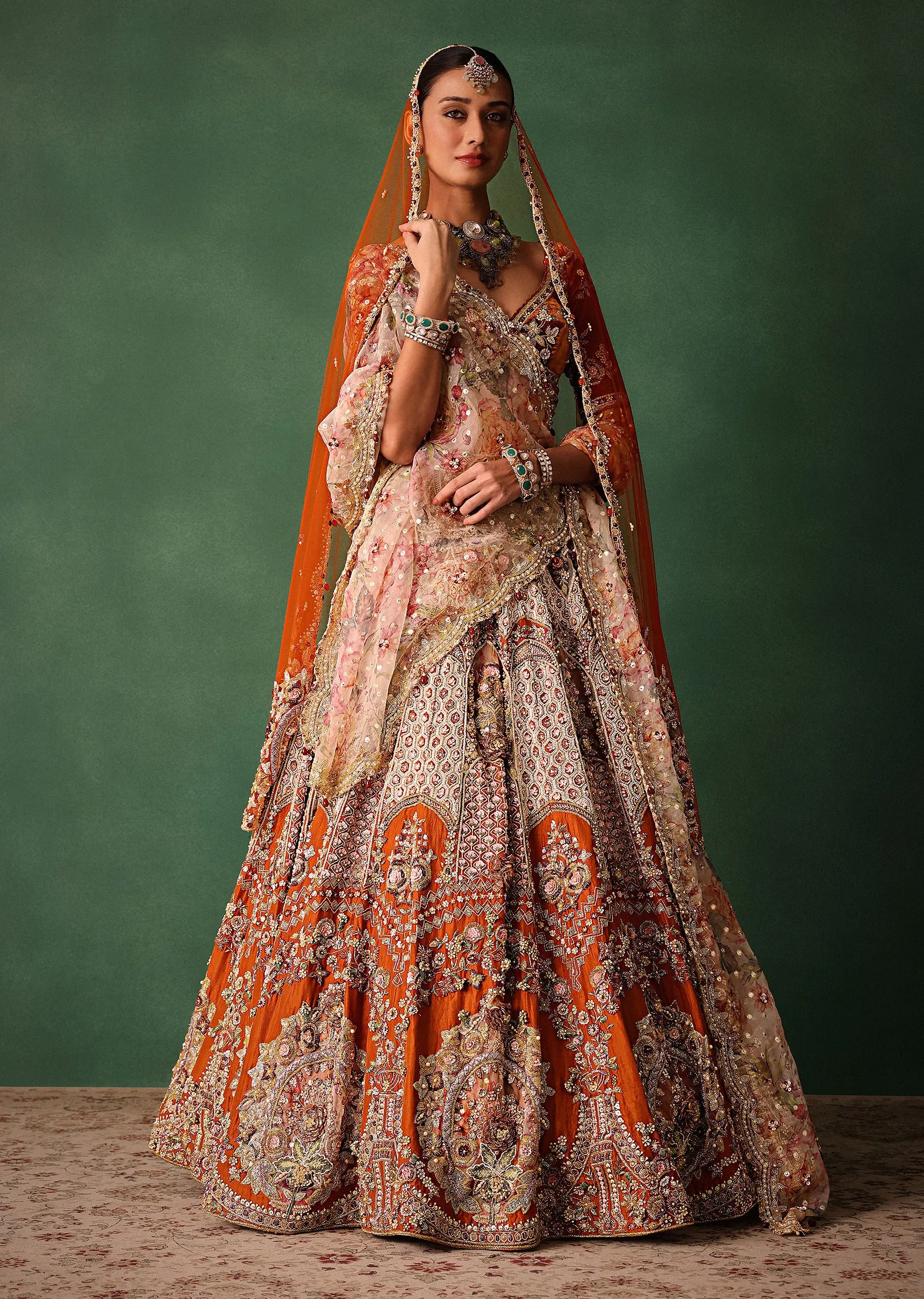 Rust V Neck Blouse With Heavy Jaal Cutdana Work Bridal Lehenga And Heavy Dupatta